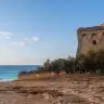 La costa di Rivabella con la Torre Sabea, nella luce della sera