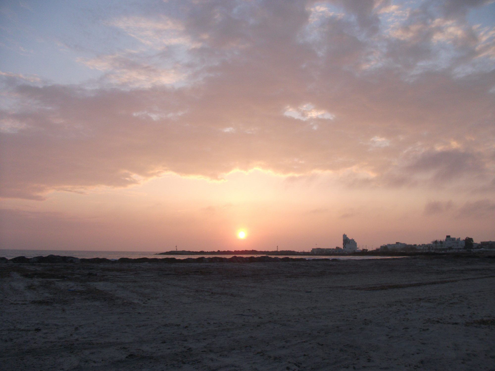 Il sole che scende verso Torre San Giovanni