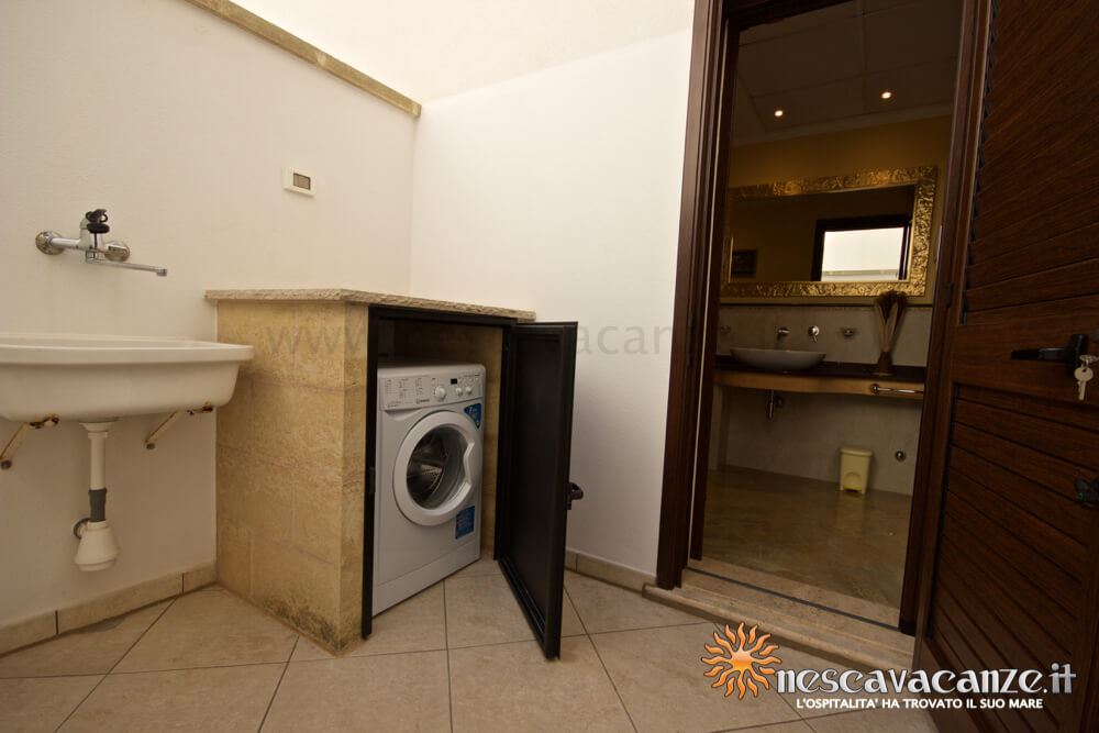 Zona lavanderia casa Pescoluse 9